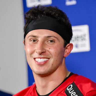 Headshot of Tommy DeVito