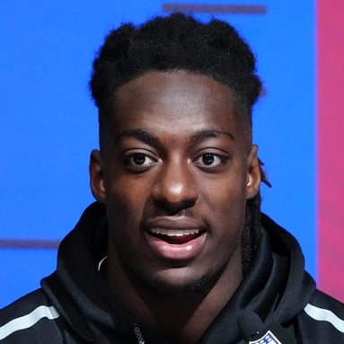 Headshot of Jelani Woods