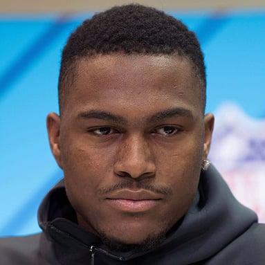 Headshot of Auden Tate