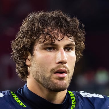 Headshot of AJ Barner