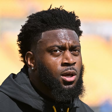 Headshot of Patrick Queen