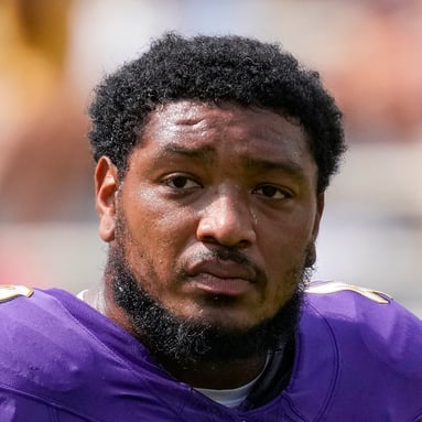 Headshot of Malik Harrison