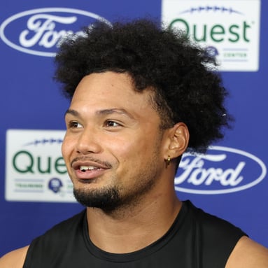 Headshot of Darius Muasau