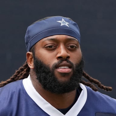 Headshot of Osa Odighizuwa