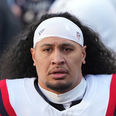 Headshot of Jahlani Tavai