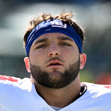 Headshot of Cameron Skattebo