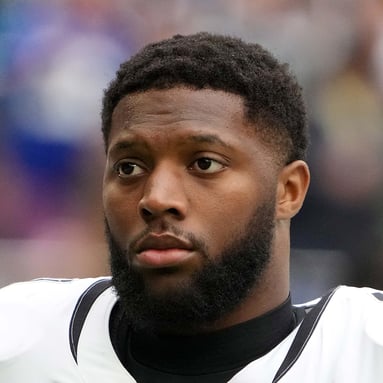 Headshot of Josh Hines-Allen